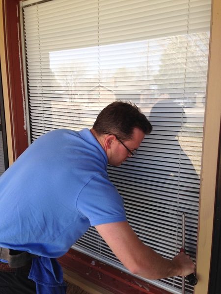 Professional window cleaning on a Dripping Springs, TX home